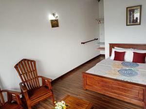 Postel nebo postele na pokoji v ubytování Kadalla Cottage