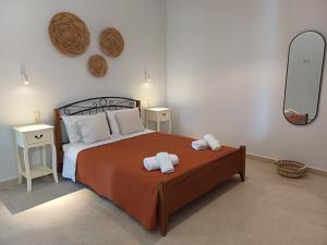 A bed or beds in a room at Villa Agrielia Még 37 kép