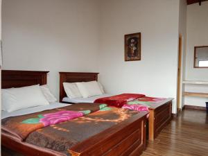 Postel nebo postele na pokoji v ubytování Kadalla Cottage