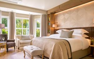 Ένα ή περισσότερα κρεβάτια σε δωμάτιο στο Brook Lane Hotel