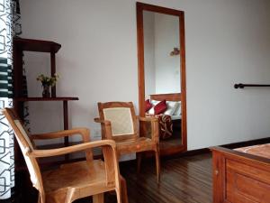 Posezení v ubytování Kadalla Cottage
