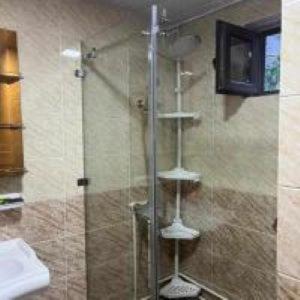 a shower with a glass door in a bathroom at Milikbek Dodikhudo in Khorog +15 photos