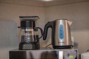 Uptown BGC Luxury 1br Suite with Fast Wifiにあるコーヒーまたはお茶