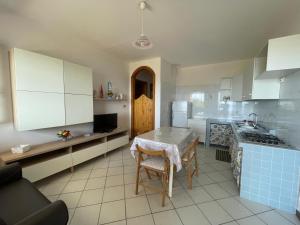 Kuchyň nebo kuchyňský kout v ubytování Villa Muntiranni