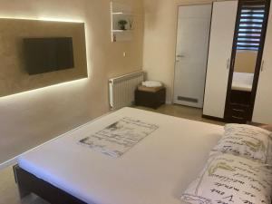 Postel nebo postele na pokoji v ubytování Hostel Jedvaj