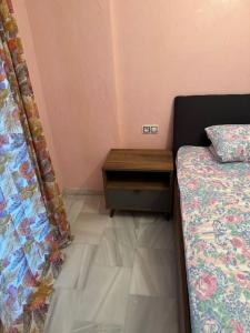 En eller flere senge i et værelse på Le Petit Riad Coeur du centre de Tanger Corniche