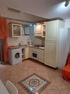 Kuchyň nebo kuchyňský kout v ubytování casa vicoletto