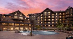 Una representación de un hotel con piscina. en 1302 Lodge At Spruce Peak Ski In Ski Out Two Bedroom By Stowe Mountain Rentals, en Stowe