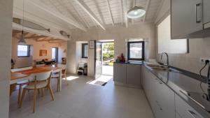 Kuchyň nebo kuchyňský kout v ubytování Casa do Norte + 37 fotografií
