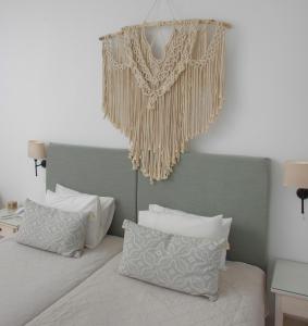 Кровать или кровати в номере Hotel Benois