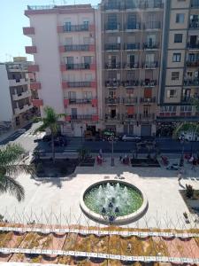 Budova, kde se apartmán nachází + 2 fotografie