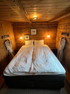 Llit o llits en una habitació de Eidegrend Boutique Hotel