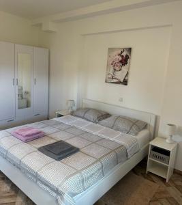 Posteľ alebo postele v izbe v ubytovaní Apartman Ferenac