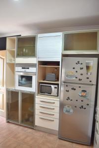 Kuchyň nebo kuchyňský kout v ubytování El Rincon de Piedra - Tu Hogar En Vacaciones