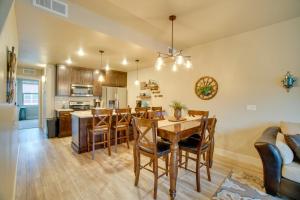 a kitchen and dining room with a table and chairs at Lovely McCall Retreat Less Than 2 Mi to Payette Lake! in McCall