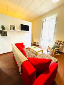TV a/nebo společenská místnost v ubytování Apartamentos Templo Diana -Vistas Históricas-