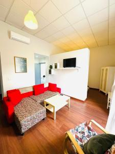 TV a/nebo společenská místnost v ubytování Apartamentos Templo Diana -Vistas Históricas-