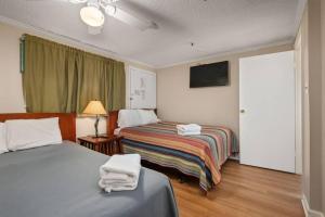 Ένα ή περισσότερα κρεβάτια σε δωμάτιο στο ML 335 Three BR Ski In Out Slopes +38 φωτογραφίες