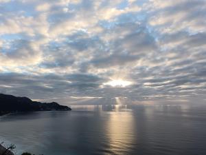a view of a body of water with a cloudy sky at Dream View Preveza in Preveza