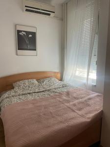 Manhattan apartman Jorgovan Belvil 객실 침대