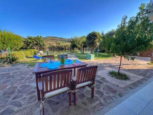 The swimming pool at or close to Exclusive Riverside House in the Center of Bosa - Private Garden and Parking" Bosa Apartments