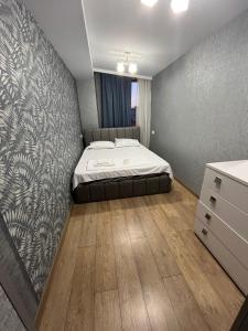 Ένα ή περισσότερα κρεβάτια σε δωμάτιο στο The best +6 φωτογραφίες