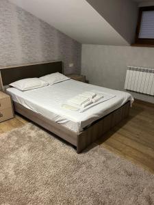 Ένα ή περισσότερα κρεβάτια σε δωμάτιο στο The best