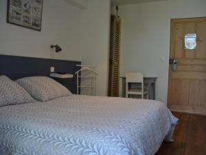 Postel nebo postele na pokoji v ubytování Le Mole (Appartements et Chambres)