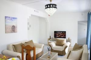 Svetainės erdvė apgyvendinimo įstaigoje Garden Suite