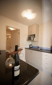Kuchyň nebo kuchyňský kout v ubytování Absolute Bliss Apartments + 36 fotografií
