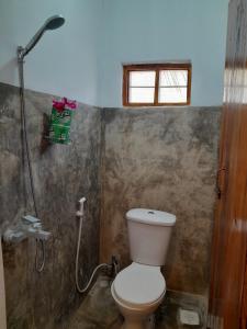 Koupelna v ubytování Nyumbani Hostel + 38 fotografií