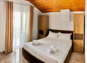 Postel nebo postele na pokoji v ubytování Rooms by Lion