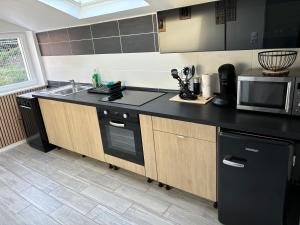 Η κουζίνα ή μικρή κουζίνα στο Maison Wallers 500m des mines