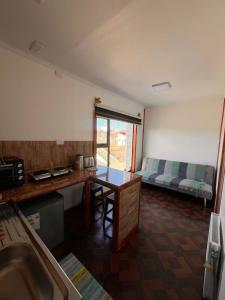 Kuchyň nebo kuchyňský kout v ubytování LOFT Glaciar Serrano