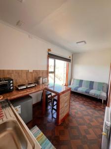 Kuchyň nebo kuchyňský kout v ubytování LOFT Glaciar Serrano + 29 fotografií