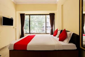 Postel nebo postele na pokoji v ubytování Hotel O Lal Sai Residency
