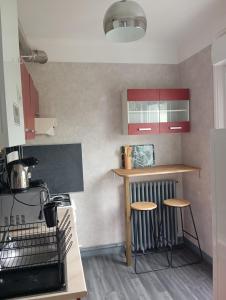 Kuchyň nebo kuchyňský kout v ubytování Appartement hyper centre 3 Lorient