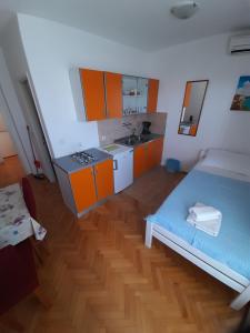 Kuchyň nebo kuchyňský kout v ubytování Apartmants Emy