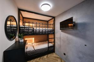 Ένα ή περισσότερα κρεβάτια σε δωμάτιο στο Apartmán u Lipna-Frymburk 5 +3 φωτογραφίες