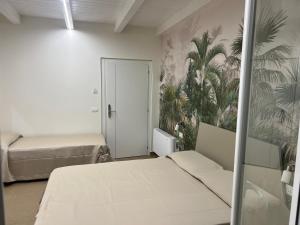 Postel nebo postele na pokoji v ubytování Rupella b&b