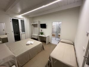 Postel nebo postele na pokoji v ubytování Rupella b&b