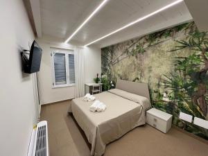 Postel nebo postele na pokoji v ubytování Rupella b&b