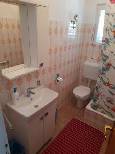 Koupelna v ubytování Apartmants Emy