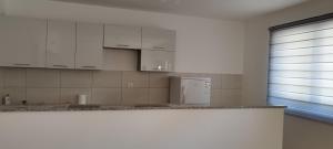 Kuchyň nebo kuchyňský kout v ubytování Tamaris apartments Risan