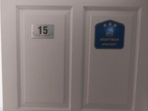 a door with a sign that says amphibian museum at Apartman Obadovic in Banja Koviljača