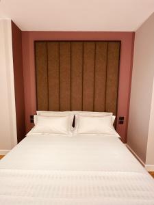 Postel nebo postele na pokoji v ubytování Azul Rooms Tirana