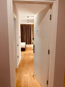 Postel nebo postele na pokoji v ubytování Azul Rooms Tirana