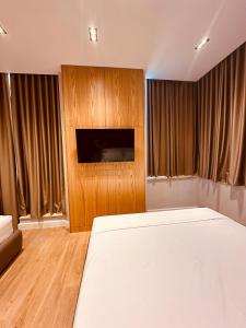 Postel nebo postele na pokoji v ubytování Azul Rooms Tirana