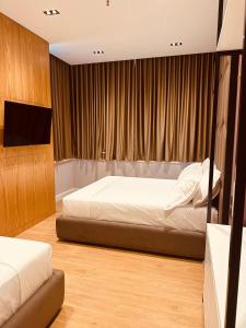 Postel nebo postele na pokoji v ubytování Azul Rooms Tirana