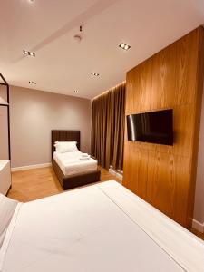 Postel nebo postele na pokoji v ubytování Azul Rooms Tirana